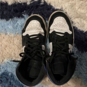 Black blue and white Jordan 1’s
